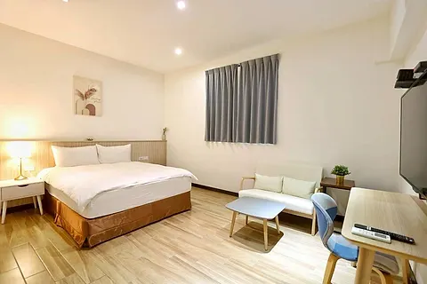 Double room with marble ensuite, work desk, and armchair
