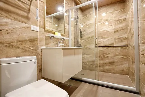 Double room with marble ensuite, work desk, and armchair