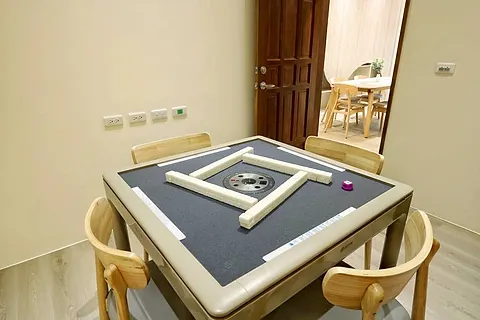 Close-up of Family Hall's electric mahjong table